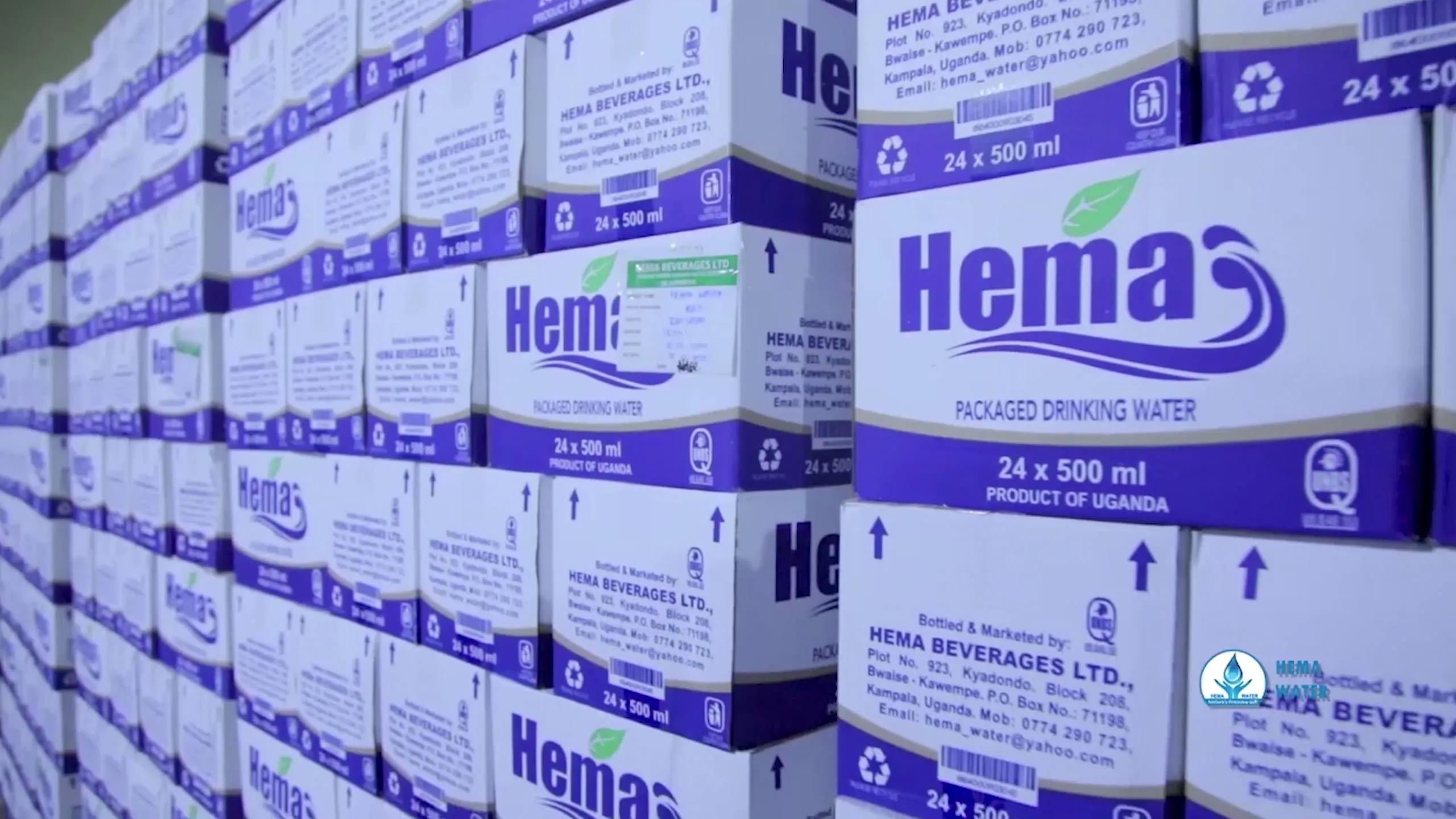 Cartons of Hema water, 24 x 500 ml, stacked at the plant